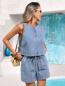 新款女士牛仔短裤，宽松版型，高腰设计，弹性腰带，纯色，简约休闲，蓝色波西米亚风，适合音乐节、夏季春季、海滩度假等场合。 - 中等水洗藍 - 查看 4