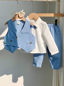 SHEIN Bộ 3 món cho bé trai, thời trang xuân hè, áo vest và quần màu xanh dễ thương, trang phục lịch lãm, thích hợp cho các lễ hội, đám cưới, lễ rửa tội, sinh nhật lần thứ nhất, tiệc mừng em bé chào đời, trang nhã, khách mời đám cưới, phù rể, phù rể nhí, lễ Phục sinh. - Màu xanh lam - Xem 1