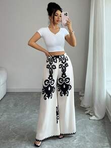 SHEIN Elenzya Pantalones anchos estampados para mujer, elegantes, casuales para vacaciones, viajes, moda, citas, estilo francés retro, versátiles para primavera y verano, con estampado en color negro sobre base color albaricoque, nuevos pantalones anchos - Multicolor - Ver 4