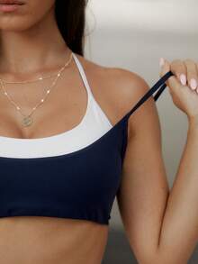 Aralina Bộ đồ thể thao năng động 2 mảnh dành cho nữ, áo croptop và quần short cạp chéo phối màu tương phản, thích hợp cho tập gym và tập luyện. - Màu xanh hải quân - Xem 5