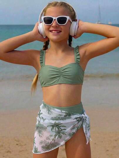 SHEIN Tween Girls Solid Military Green, Ruffled Strapless Top, Triangle Swim Trunks, Sarong Skirt, Fashionable, Casual, And Elegant Design, Suitable For Swimming, Vacation, And Summer (Random Pattern). Swimsuit Sets, Conservative Bikini Sets, Full-Coverage Bikini Sets, Three-Piece Swimsuit Sets For Girls, Beachwear, Children's And Girls' Bikini Sets, Matching Swimsuits For Girls, Summer Swimsuit Sets, Two Pieces Summer Three-Piece Swimsuit Sets, Three-Piece Bikini Sets With Sarong Skirts