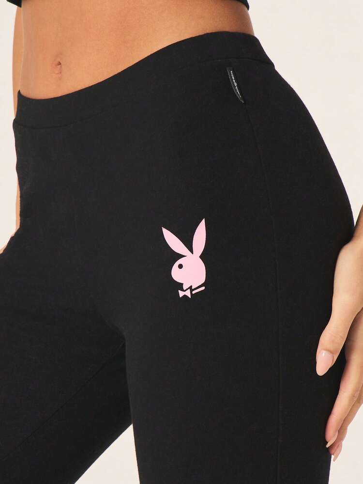 Missguided x Playboy Leggings noirs à fente latérale pour femmes avec logo lapin, taille haute, longueur intégrale, stretch, pantalon de détente casual pour le confort et le style