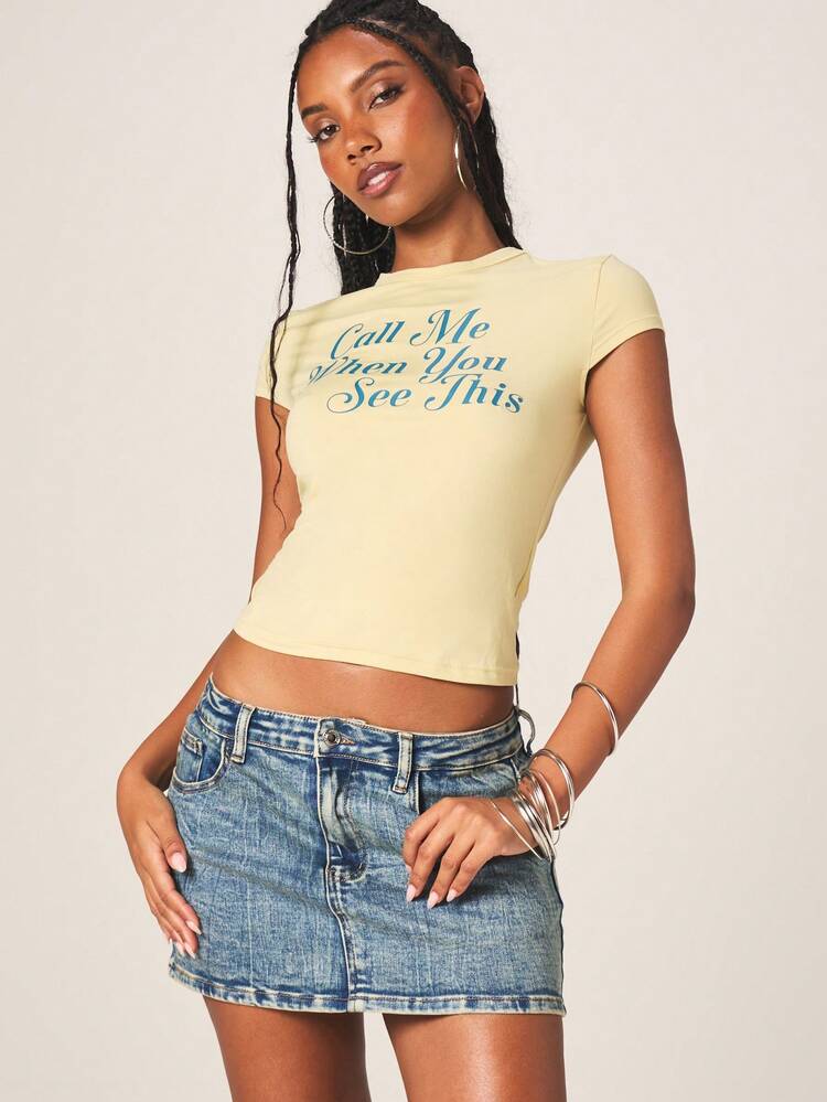 MISSGUIDED Women's Call Me When You See This Baby Tee Short Sleeve Crew Neck Fitted Yellow T-Shirt With Text Print Casual Top