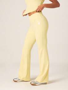 Missguided x Playboy High Rise Cross Over Waist Flared Leggings With White Bunny Logo For Activewear - Yellow - View 1