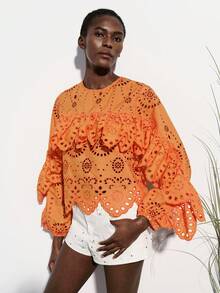 Aveloria Modichic Bright Orange Hollow Embroidered Blouse, Laser Cut Craftsmanship, Vibrant Orange Tone, Bohemian Style, Round Neck Layered Ruffle Trim, Long Sleeve With Elastic Cuffs, 3D Floral Embroidery Elements, Sheer Lightweight Fabric, Fitted Cropped Silhouette, Suitable For Spring/Summer Outdoor Music Festivals, Vacations, Art Exhibitions And Fashion Parties, Highlighting Lively And Unique Personalized, With Visual Impact And Comfort - Orange - View 5