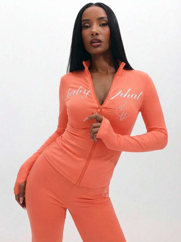BABYPHAT Women's Zip Up Long Sleeve Coral Top With Script Print And Fitted Silhouette