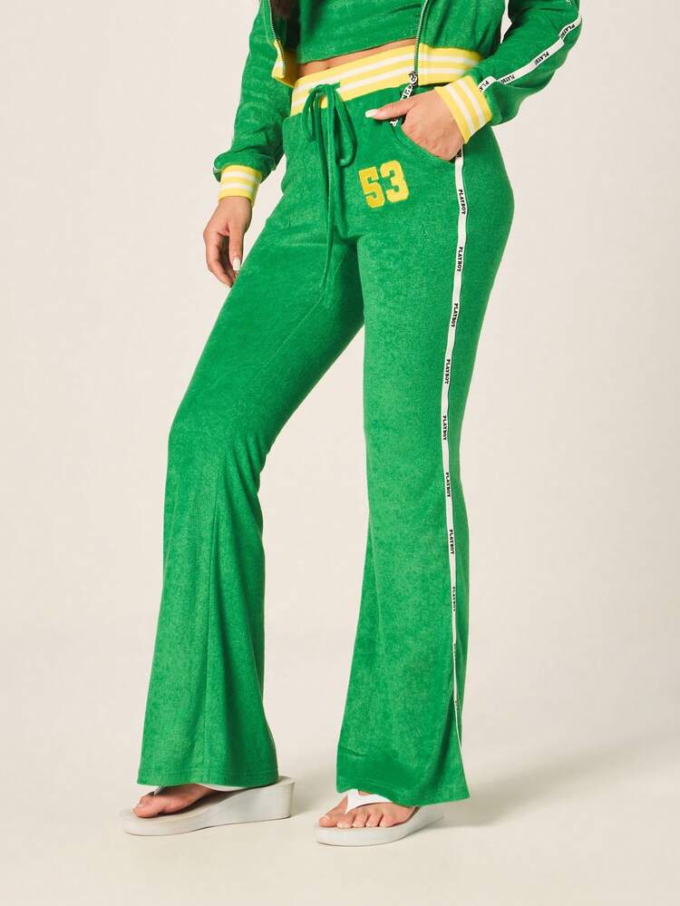 Missguided x Playboy Women's Green Terry Towelling Flare Leg Joggers With Logo Print And Yellow Stripe Waistband Contrast Details