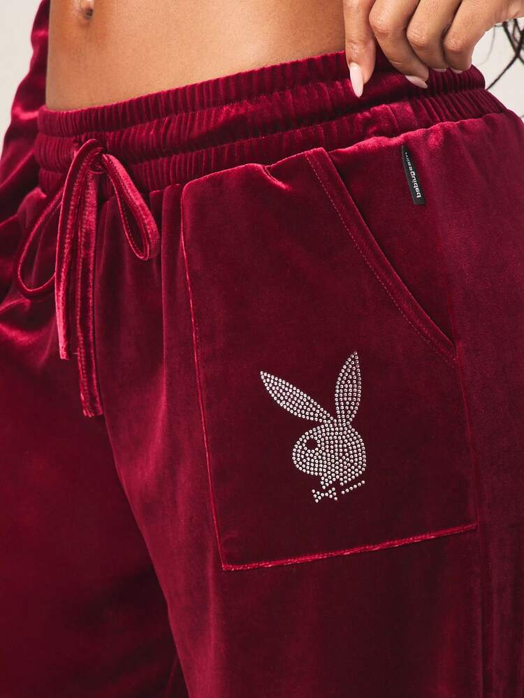 Missguided x Playboy Luxurious Burgundy Velvet Wide Leg Sweatpants With Drawstring Waist And Rhinestone Text Detail For Casual Comfort And Loungewear