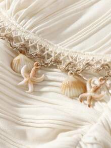 GlowEve Women's Cream White 2-Piece Set,Summer Elegant Tropical Vacation Holiday Wavy Striped Pleated Starfish & Shell Decor Spaghetti Strap Top & Shorts - Apricot - View 4