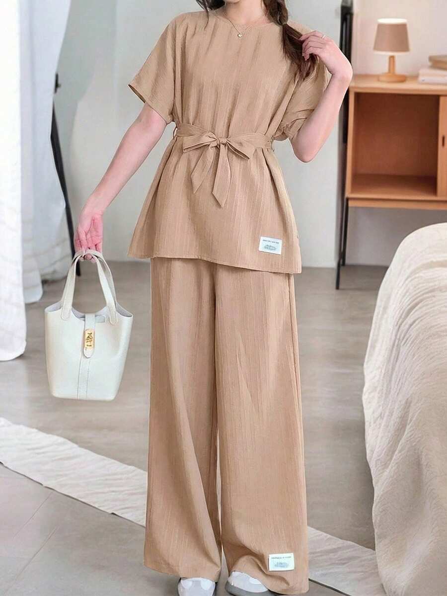 SHEIN 少女两件套:宽松插肩袖系带腰身印花上衣和阔腿裤,适合春夏季节、度假、休闲外出、春季野餐、日常穿着。 - 杏色 - 查看 1