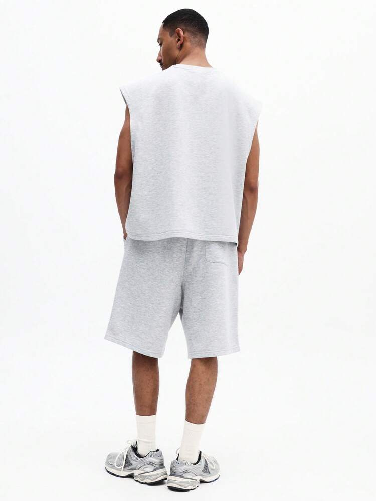 Set coordinato da uomo composto da canotta girocollo e pantaloncini abbinati, outfit casual estivo da relax in due pezzi