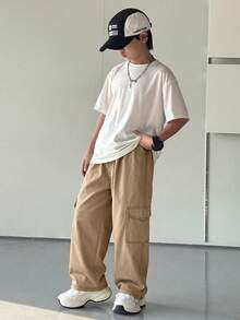 SHEIN 1件装青少年男童休闲运动学院风文艺复古直筒裤，带工作口袋和撞色线条装饰，适合返校、生日派对、晚宴、演出、婚礼、洗礼、开幕式、日常穿着，适合上学、度假、旅行、运动，适合春夏季节。 - 卡其色 - 查看 3