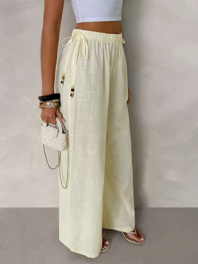 SHEIN Glamour Pantalones largos de cintura baja con ajuste holgado y decoración de perlas, estilo de vacaciones para mujer