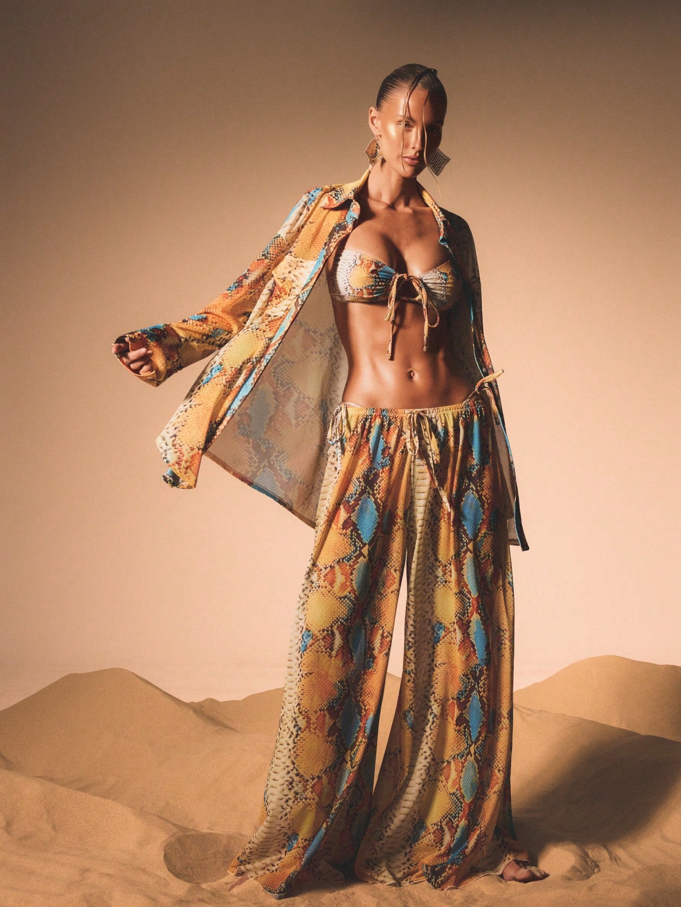 KIZN Pantalones palazzo de malla con pierna ancha y estampado de serpiente