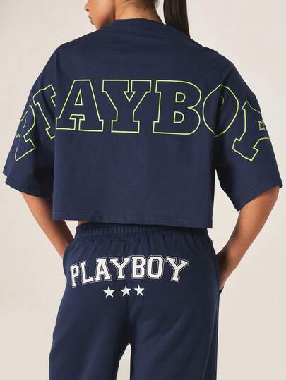 Missguided x Playboy Camiseta gráfica oversize azul marino con gran estampado en la espalda y pequeño logotipo frontal, top corto de manga corta