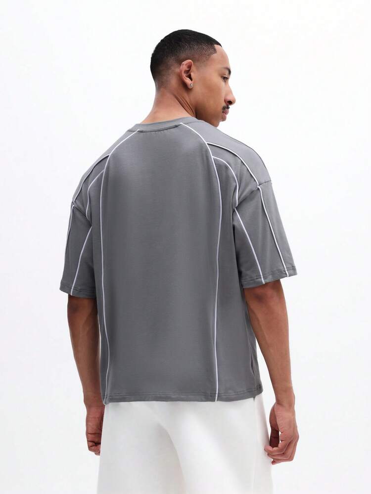 Camiseta Masculina Oversized com Detalhe de Pesponto, Manga Curta, Gola Careca, Caimento Relaxado, Casual, Streetwear, Verão, Primavera