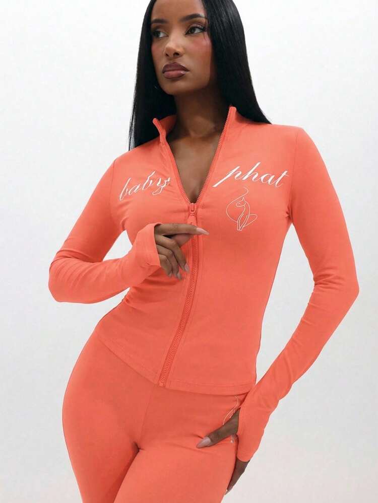 BABYPHAT Women's Zip Up Long Sleeve Coral Top With Script Print And Fitted Silhouette