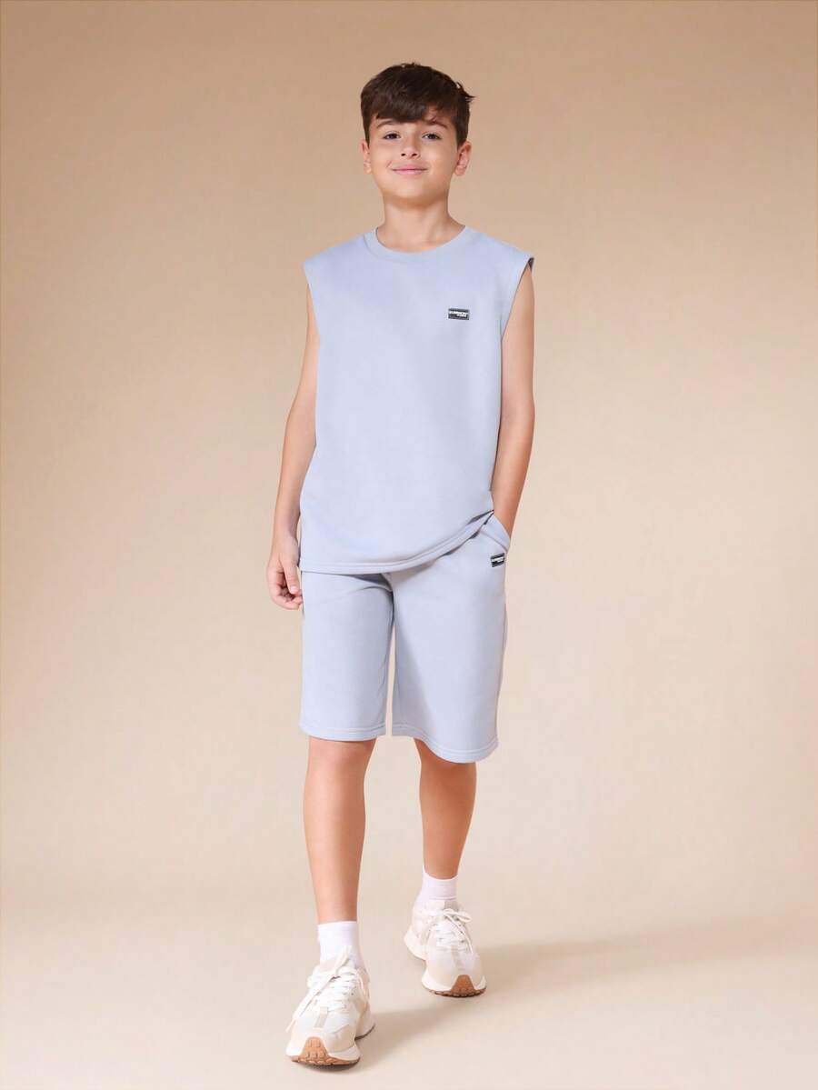 SUMWON Bộ đồ đôi cho bé trai màu xanh nhạt gồm áo ba lỗ và quần short cùng màu, kiểu dáng thường ngày, cổ tròn. - màu xanh lá - Xem 1