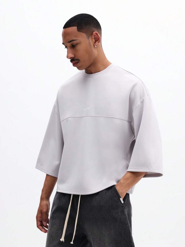 Felpa girocollo oversize con maniche a tre quarti