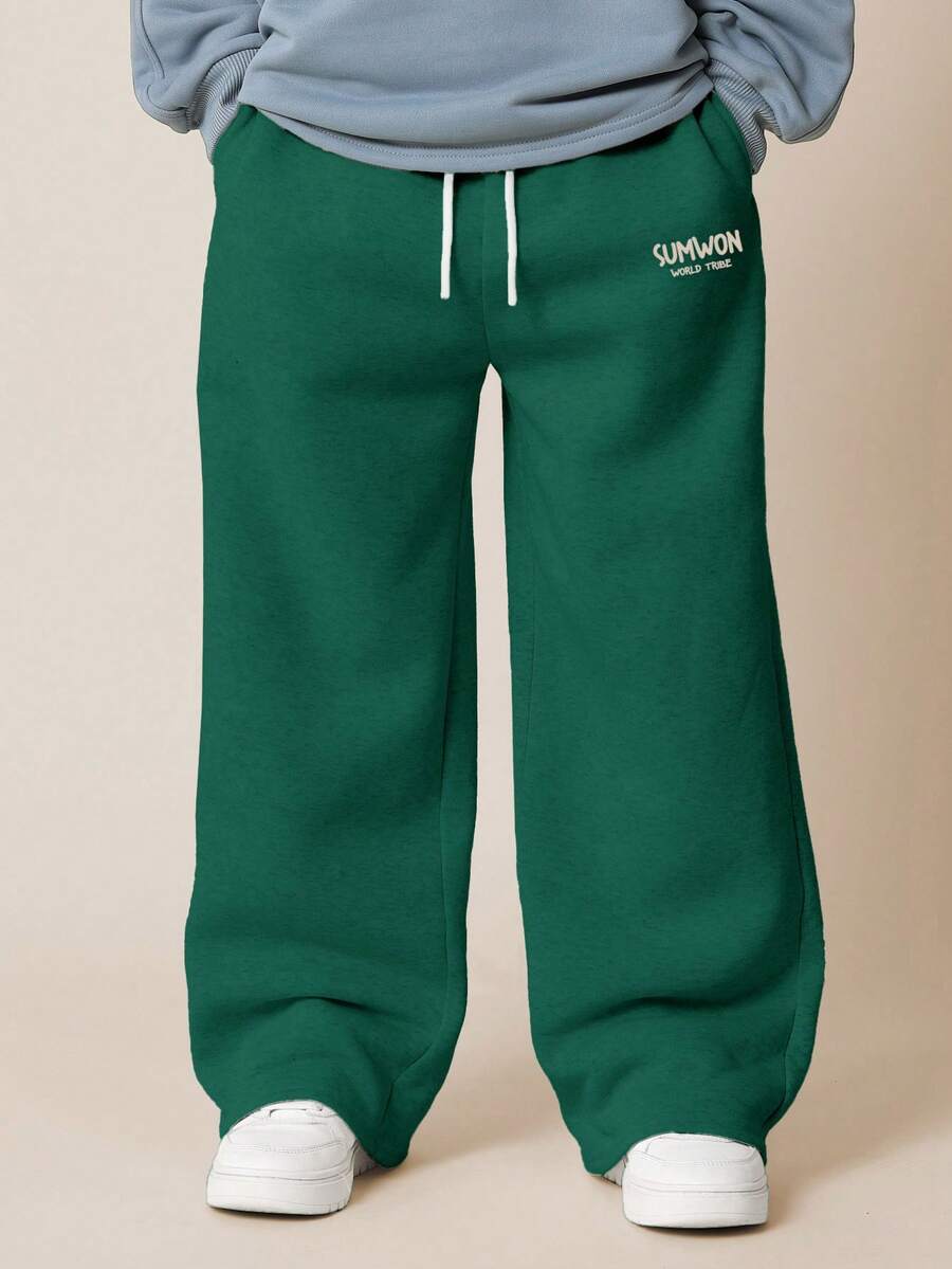 SUMWON Pantalones de chándal con pierna ancha para niños preadolescentes con cintura con cordón y ajuste relajado para uso casual diario y vacaciones - Verde Oscuro - Ver 1
