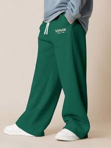 SUMWON Pantalones de chándal con pierna ancha para niños preadolescentes con cintura con cordón y ajuste relajado para uso casual diario y vacaciones - Verde Oscuro - Ver 2