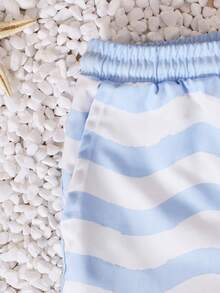 SUMWON Pantalones cortos de baño con estampado de rayas onduladas en todo el diseño, con cordón y bolsillos laterales para niños, para verano, playa, natación, vacaciones y uso casual - Celeste - Ver 5