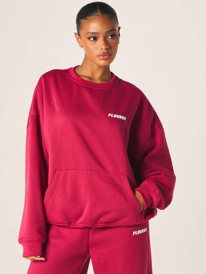 Missguided x Playboy Áo nỉ cổ tròn dáng rộng với túi giữa và họa tiết logo, thích hợp cho những ngày đông thu thoải mái.