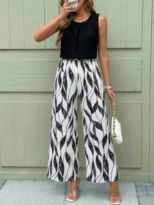 SHEIN Clasi Bộ đồ nữ thanh lịch gồm áo sơ mi xếp ly màu trơn và quần ống rộng in họa tiết cây cỏ, set 2 món mùa hè cho nữ, trang phục mùa hè cho nữ, bộ đồ phối váy và áo mùa hè cho nữ, bộ quần áo nữ. - màu đen - Xem 4