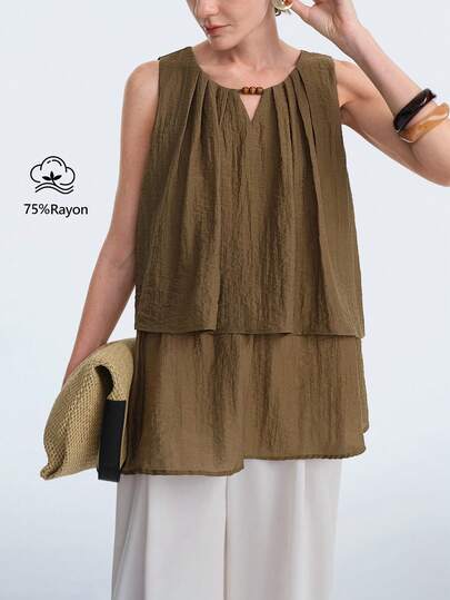 Aalyst Áo kiểu nữ mùa xuân/hè thanh lịch, sang trọng, thiết kế tối giản, phong cách bohemian thường ngày, thích hợp đi nghỉ mát/công sở, vintage, thoải mái, màu trơn, chất liệu cotton giả lanh, cổ tròn, đính hạt gỗ, viền bèo hai lớp, dáng chữ A rộng rãi, không tay.