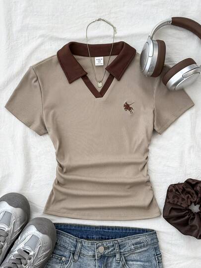 SHEIN Áo croptop cổ bẻ màu xanh hải quân và trắng dành cho bé gái tuổi teen, kiểu dáng thường ngày phối màu tương phản, ôm sát người, có thêu logo nhỏ.