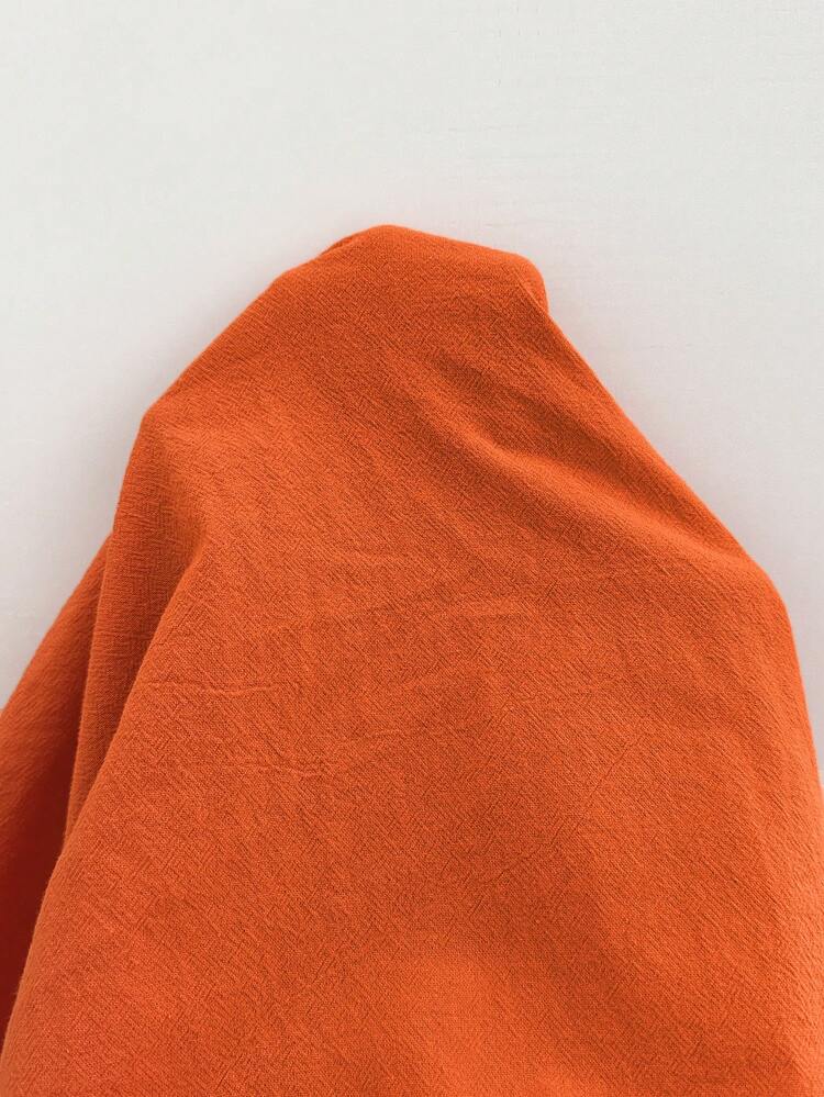 Plus Size Women's Summer Casual Vacation Country Solid Color Burning Orange Ruffle Hem Long Loose Fit Basic Short Sleeve Blouse,Comfortable And Breathable,Summer Holiday,Spring Break,Vacation,Holiday,Going Out,2026 New,Simple And Fashionable For Everyday Wear