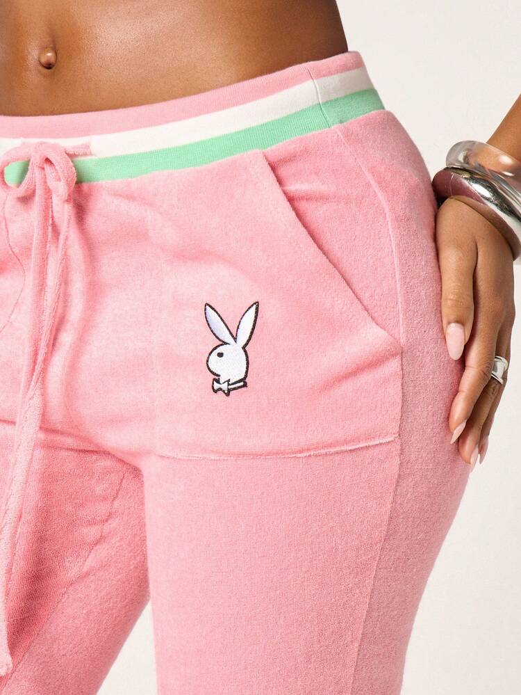 Missguided x Playboy Pantalon de jogging évasé en éponge avec logo lapin rose, taille avec cordon de serrage et bordure bicolore