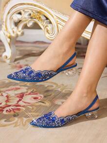 CUCCOO TILAWA 这款女鞋时尚优雅，采用水晶高跟设计，饰有水钻和激光蕾丝，蓝色尖头高跟鞋款式，适合宴会、派对等场合穿着。 - 蘭 - 查看 6