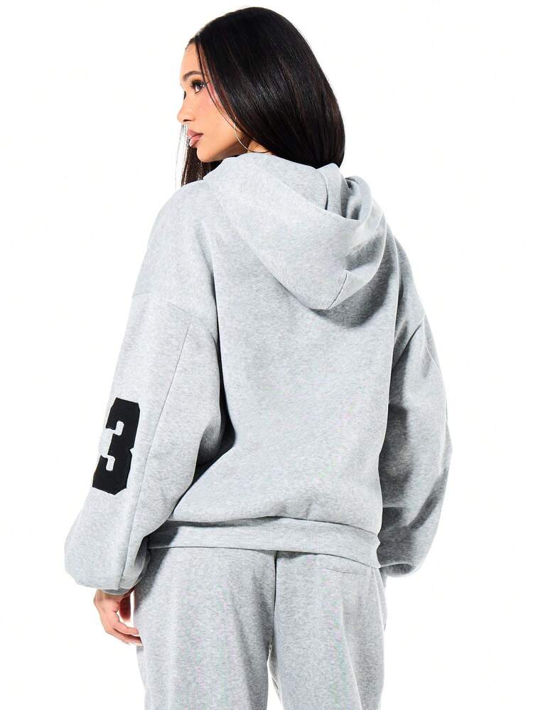 SUMWON Sudadera con capucha de ajuste holgado para mujer con cremallera completa, con gráficos de la estatua de la Libertad de Nueva York y detalles de texto, ropa casual de calle