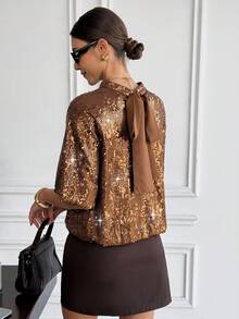 SHEIN Frenchy ملابس علوية أنيقة للنساء بلون أحادي مرقّع بالترتر والعقدة، ملابس علوية فرنسية رجعية بفيونكة من الترتر، أكمام فوانيس ذهبية بنية، ملابس نسائية فاخرة لامعة للحفلات، ملابس علوية مرصعة بالترتر، ملابس علوية لامعة، للصيف والعطلات والمناسبات الأنيقة، بلوزات للوصيفات، ملابس علوية للحفلات - بني - مشاهدة 4