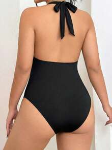 Elenzga Mono de mujer talla grande con escote profundo en V, decoración metálica, espalda descubierta y corte hueco en el cuello halter, para primavera/verano - Negro - Ver 2