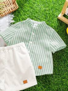 Bộ 2 món áo sơ mi tay ngắn cổ tàu kẻ sọc thoải mái, đa năng cho bé trai, gồm áo sơ mi và quần short. - Màu xanh Bạc hà - Xem 6