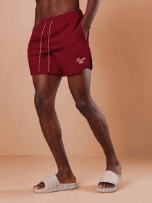 SUMWON Shorts de playa burdeos para hombres con cordón, ajuste regular, bajo curvo, traje de baño para vacaciones de verano - Rojo - Ver 2