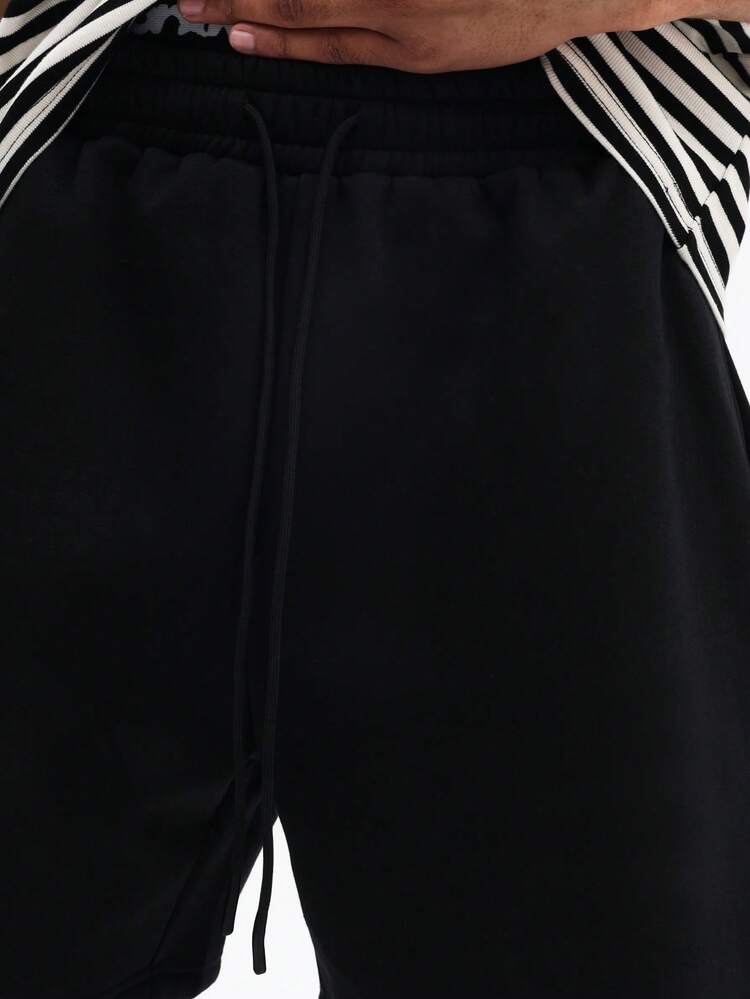 Męskie bawełniane czarne, swobodne, letnie szorty ze ściągaczem w pasie i kieszeniami bocznymi