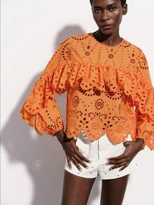 Aveloria Modichic Bright Orange Hollow Embroidered Blouse, Laser Cut Craftsmanship, Vibrant Orange Tone, Bohemian Style, Round Neck Layered Ruffle Trim, Long Sleeve With Elastic Cuffs, 3D Floral Embroidery Elements, Sheer Lightweight Fabric, Fitted Cropped Silhouette, Suitable For Spring/Summer Outdoor Music Festivals, Vacations, Art Exhibitions And Fashion Parties, Highlighting Lively And Unique Personalized, With Visual Impact And Comfort - Orange - View 3