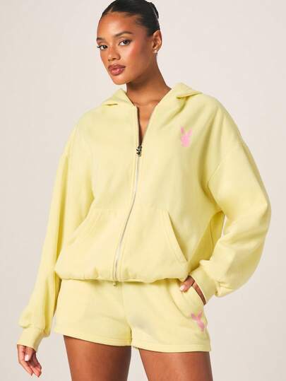 Missguided x Playboy 宽松全拉链连帽衫，饰有兔子标志和中央口袋，适合日常休闲穿着。