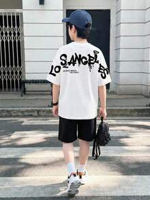 SHEIN 青少年男童休闲撞色印花短袖T恤和短裤两件套,舒适百搭,适合日常穿着、上学、郊游、户外活动、音乐节、假期、海滩度假、夏季、春夏穿着。 - 黑與白 - 查看 5