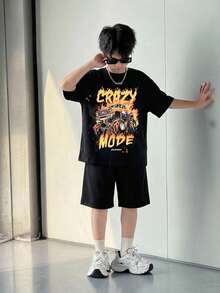 SHEIN Tween Boy Casual Street Style Big Letter Graphic Pullover T-Shirt And Solid Color Shorts 2-Piece Set Summer Outfits Y2k Vacation Tendencias Ss26 Goth Gothic Streetwear Sumwon Burgundy Holiday Vintage Boho Festival Gras Party Cute Birthday Boys Modest Casual Cozy - Multicolor - View 4