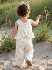 Cozy Pixies Conjunto de 2 piezas de top sin mangas con volantes y estampado floral y pantalones de cintura elástica para bebé niña - Ropa de playa bohemia para bebé niña - Ropa de resort para bebé niña - Conjunto de verano para niña pequeña con diseño de colibrí - Albaricoque - Ver 5