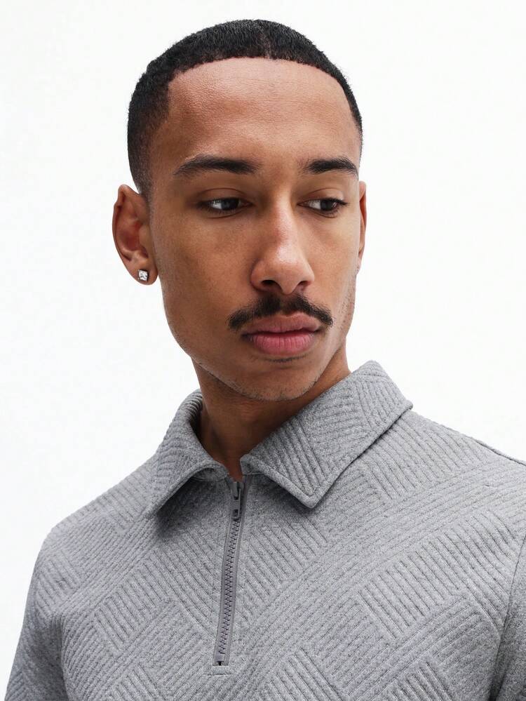 질감이 있는 쿼터 지퍼 폴로 셔츠