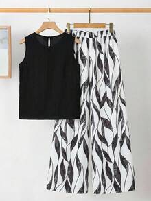 SHEIN Clasi Bộ đồ nữ thanh lịch gồm áo sơ mi xếp ly màu trơn và quần ống rộng in họa tiết cây cỏ, set 2 món mùa hè cho nữ, trang phục mùa hè cho nữ, bộ đồ phối váy và áo mùa hè cho nữ, bộ quần áo nữ. - màu đen - Xem 2