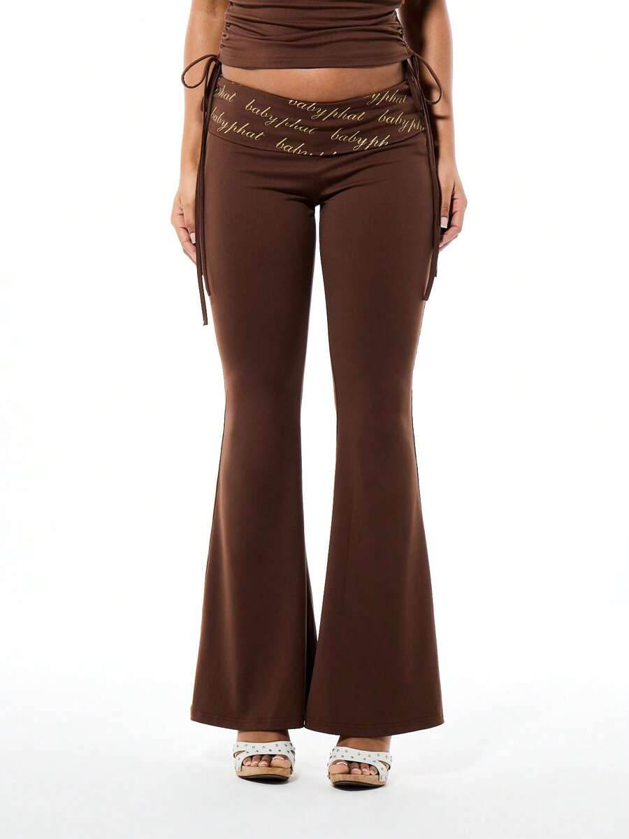 BABYPHAT Women's High Rise Fold Over Waist Printed Script Flare Bell Bottom Leggings With Tie Details - Brown - View 1