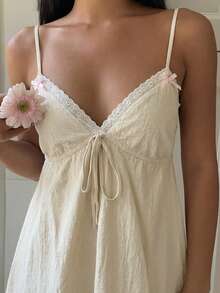 SHEIN EZwear 夏季梭织女式A字吊带蕾丝蝴蝶结迷你连衣裙娃娃裙可爱连衣裙白色连衣裙吊带裙奶油色连衣裙夏季连衣裙蕾丝边连衣裙吊带裙短款女装连衣裙女士夏季连衣裙女士夏季套装女士夏季服装度假服装女装 - 米色 - 查看 6