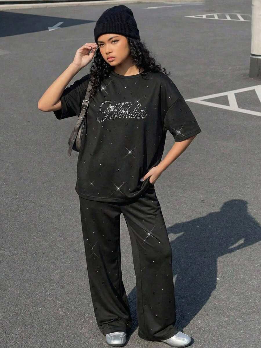Conjunto de camiseta para niñas preadolescentes, incluye camiseta holgada de manga corta negra con decoración de letras de lentejuelas y pantalones anchos holgados negros, tela suave y agradable para la piel, adecuado para uso diario y ocio de vacaciones, nueva colección de verano - Negro - Ver 1