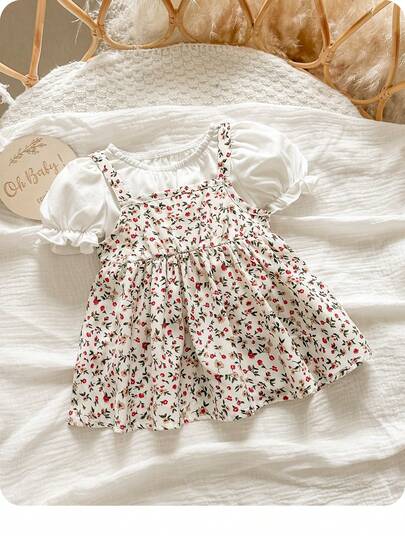SHEIN Newborn Baby Girl Cute Sweet Doll Shirt, Solid Color Bubble Short Sleeve Top And Ditsy Floral Suspender Skirt Set, Suitable For Summer